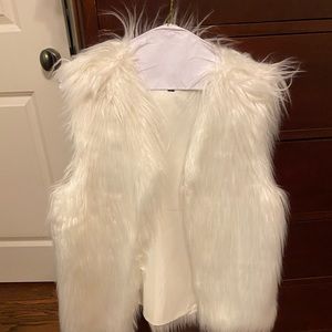Ambiance M white faux fur vest. No tags but never worn.